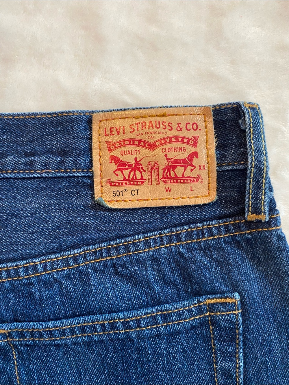 Classic Levi 501s with button-up front (size women’s M)